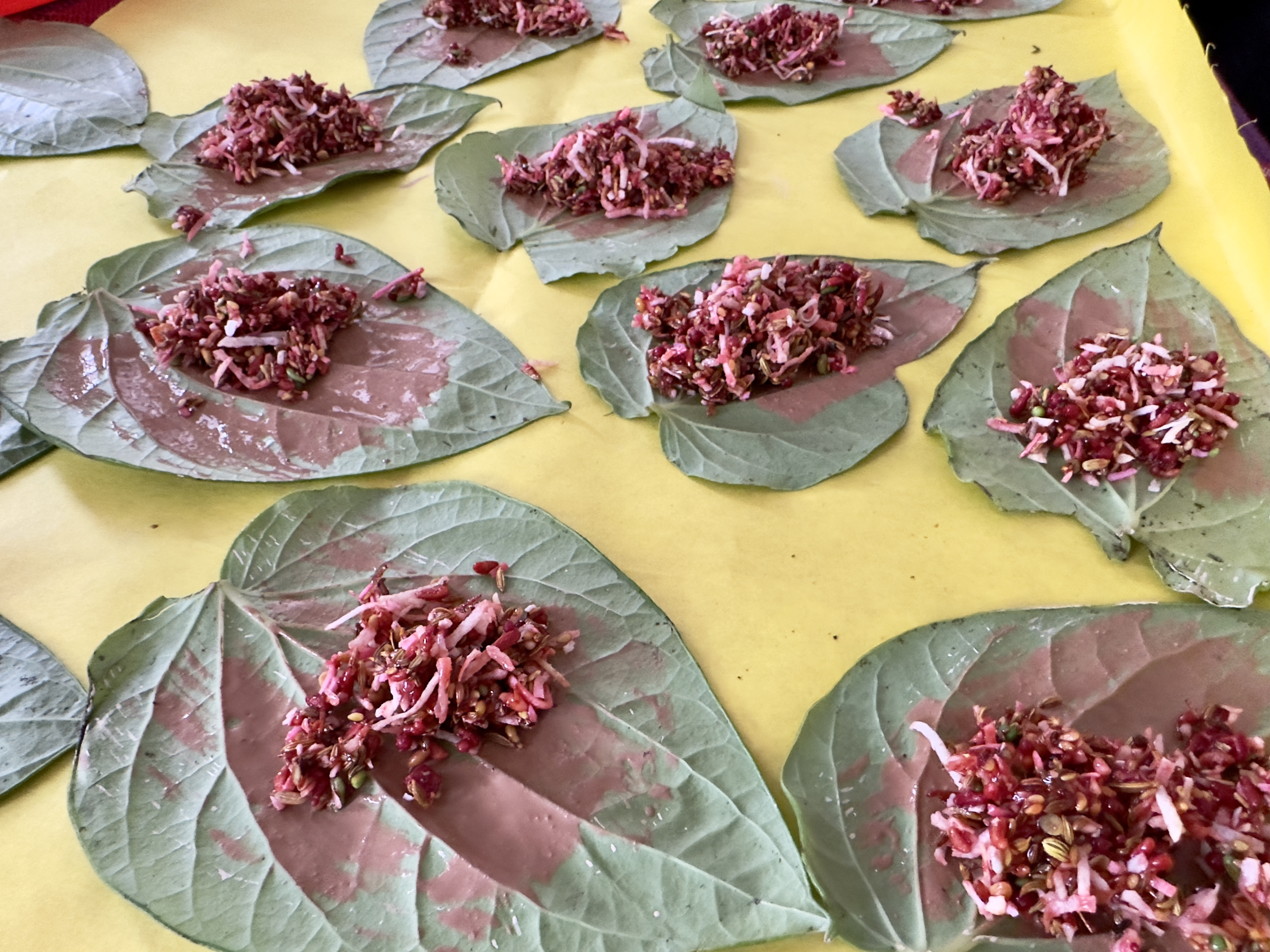 Fresh betel leaves and traditional paan ingredients